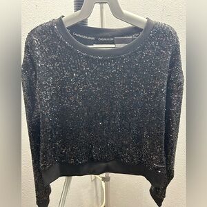 Calvin Klein black sparkle sequins long sleeve blouse.
